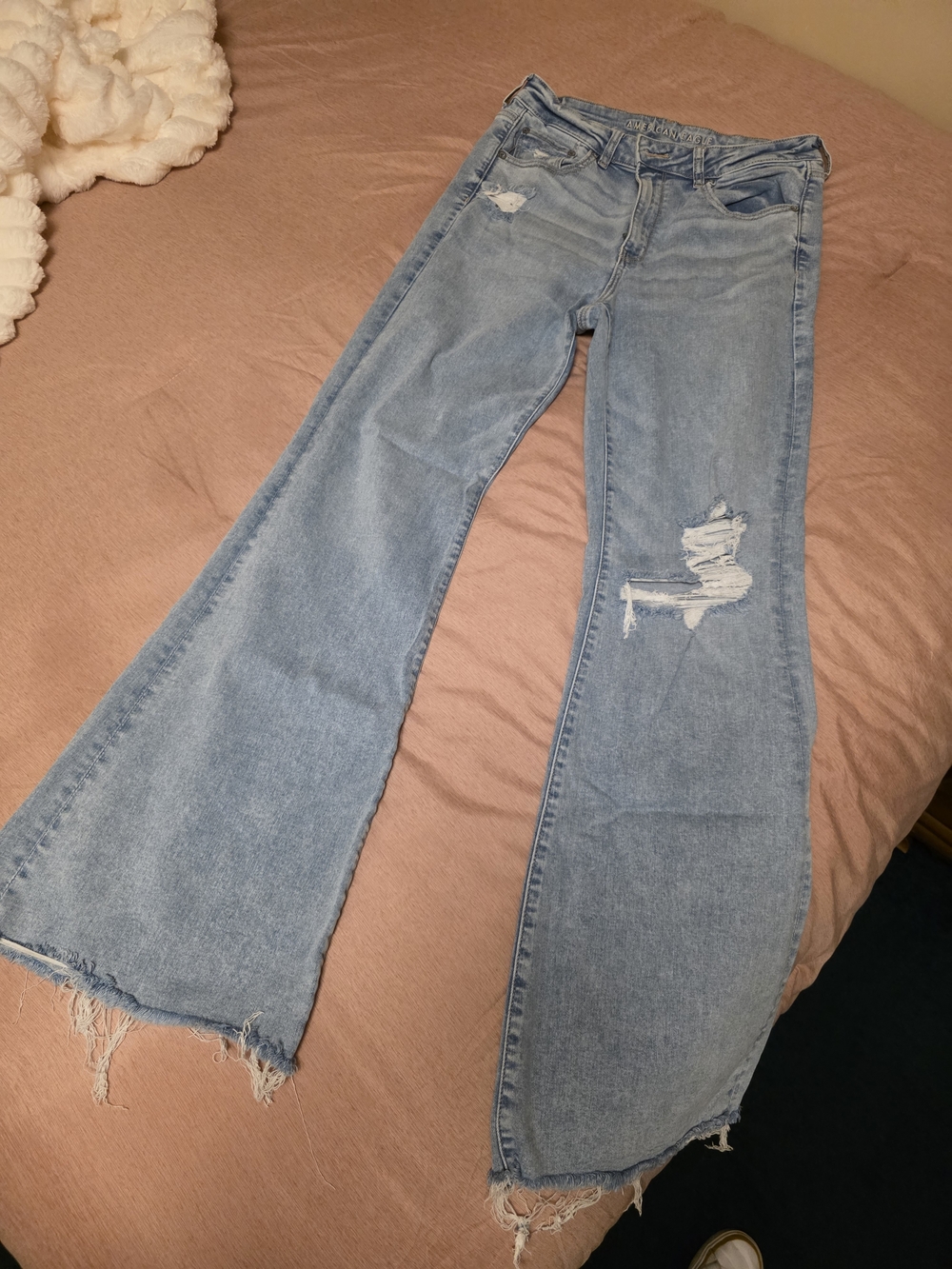American Eagle Outfitters Light Blue Flare Jeans with Distressed Details